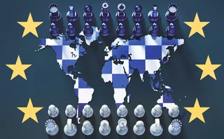 Chessboard against global map surrounded by EU stars