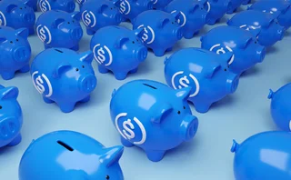 Blue, stablecoin-labelled piggy banks 