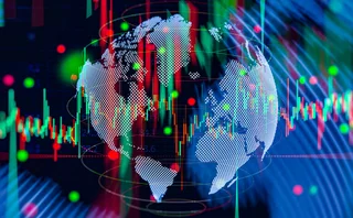 A digital-looking world globe with volatility chart overlaid