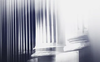 Abstract classical pillars repeated and disintegrating in overlay