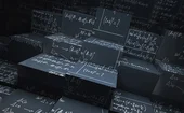 Blackboard blocks with mathematical formulas written in chalk all over them 