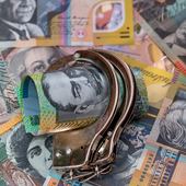 Australia dollar and handcuffs