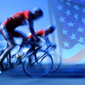 Cyclists neck and neck against US flag