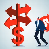 A businessman with a bag of money on his back looking at a dollar crossroads sign