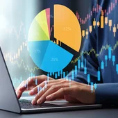 A segmented pic chart superimposed over a person’s hands on a keyboard
